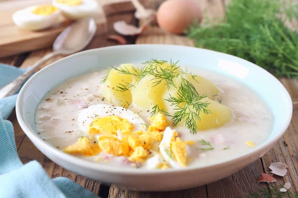 Polish soup Zurek. Sour soup with sausage,  potatoes and eggs