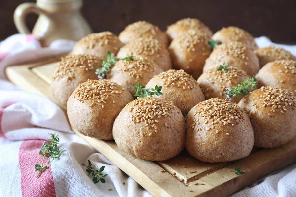 Crown sourdough bread buns with sesame garnish — Stock Photo, Image