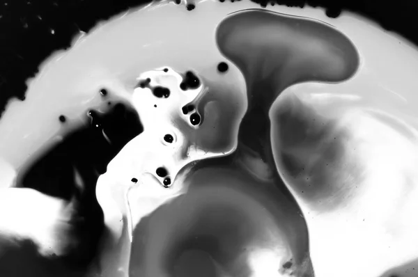 Abstract ink background. Moving liquid paint in water. White abstract shapes in chaotic movement. Artistic creative handmade illustration. Minimalistic style.