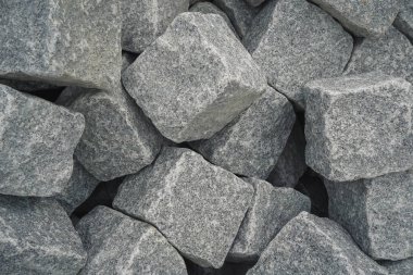 Sokak kaldırımı ve arkaplan dokusu olarak granit tuğlaları kapatın