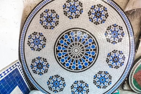 Moroccan handmade tile mosaic factory at Fez, Morocco.