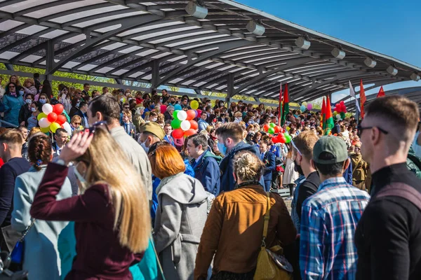 Line of people for the celebration of the 75th anniversary of the victory in the Great Patriotic War, parade of May 9 in Minsk, Belarus. Minsk, Belarus - May 9 2020.