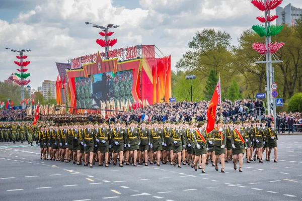 Military women marching at the celebration of the 75th anniversary of the victory in the Great Patriotic War, parade of May 9 in Minsk, Belarus. Minsk, Belarus - May 9 2020.