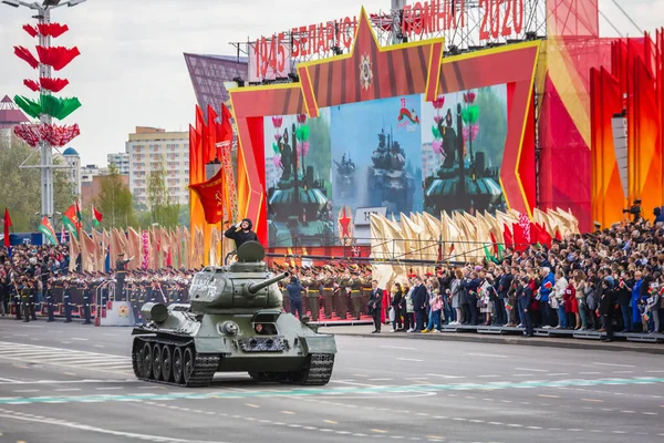 Tanks, heavy army vehicles and spectators of the celebration of the 75th anniversary of the victory in the Great Patriotic War, parade of May 9 in Minsk, Belarus. Minsk, Belarus - May 9 2020.