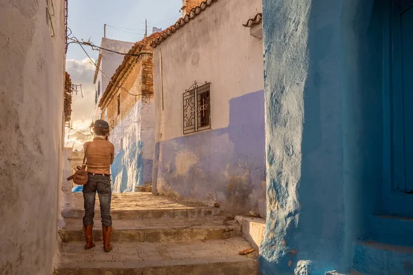 Sunset in Chefchaouen. Blue city medina in Morocco with blue painted walls.