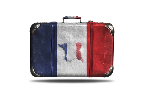 Reisekoffer mit französischer Flagge und französischer Landkarte isoliert auf weißem Hintergrund — Stockfoto
