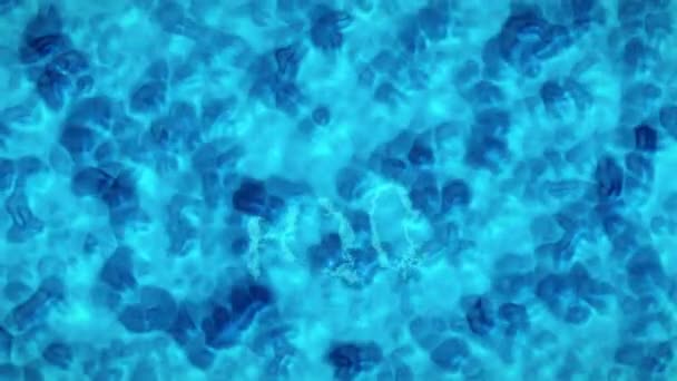 Turkoois Blauw Water Oppervlak Met Opspattend Golven Tekst Die H2O — Stockvideo