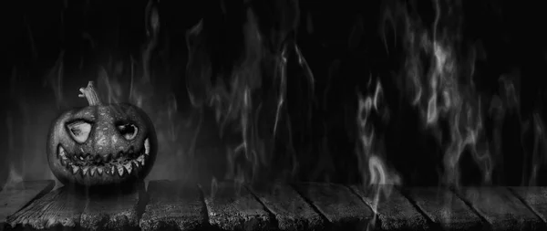 Halloween Pumpkin, Jack O Lantern Burning in Flames On Wooden Table On a Haunted, Scary Night — Stock Photo, Image