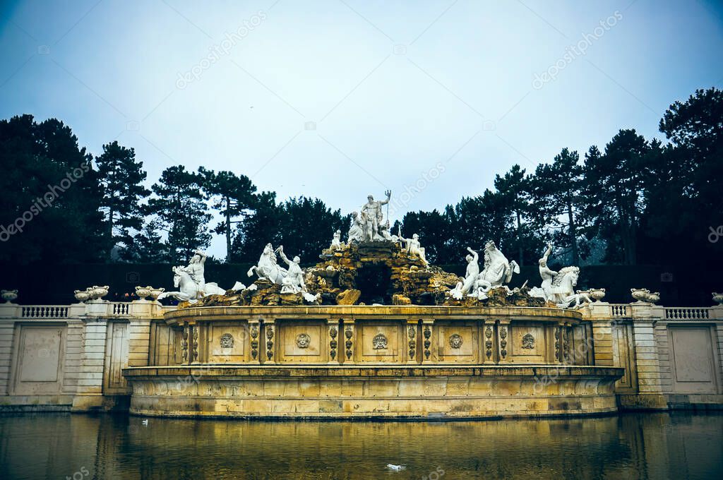 Wien; Austria - Neptune Fountain at Schonbrunn Garden in winter
