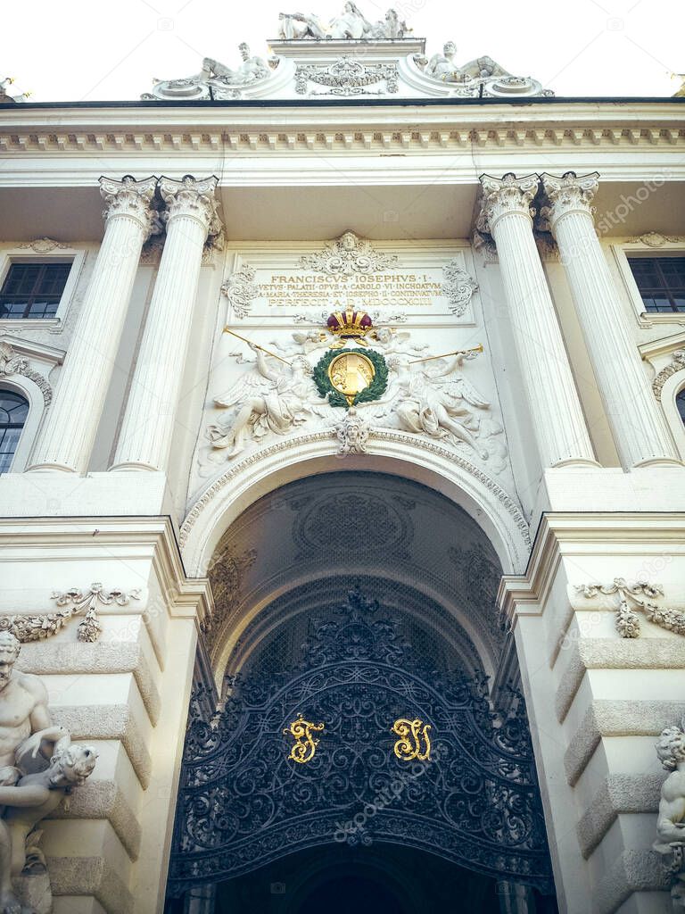Wien, Austria - The Hofburg Palace in Vienna, ancient baroque imperial palace, entrance gate from Michealerplatz