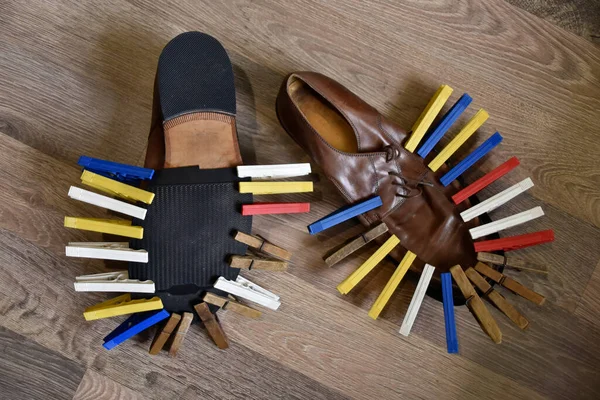 Shoes Glued Sole Sandwiched Colorful Clothespins — Stock Photo, Image