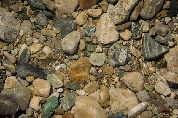 Imagen de fondo de las rocas marinas marrones y grises — Foto de Stock