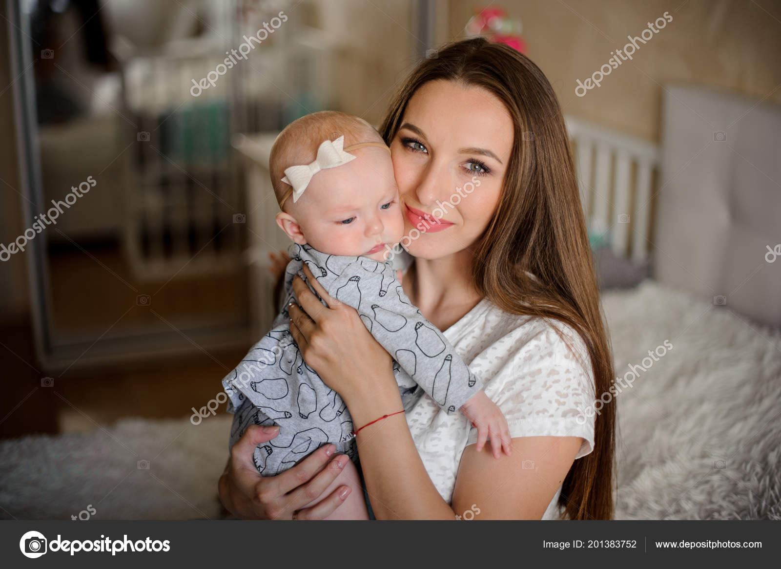 Young Brunette Mom Holding Her Little Blondie Daughter Hands Sweet Stock Photo Young Brunette Mom Holding Her Little Blondie Daughter Hands Sweet Stock Photo