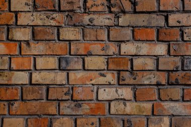 Kırmızı tuğla rustik dokulu arka plan bir dikiş bir çimento ile. Dekoratif tuğla duvar arka plan