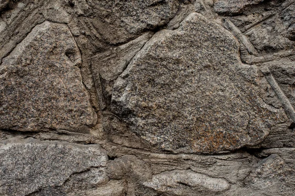 Foto Förstört Gamla Rock Yttervägg Bakgrund Tillverkad Grå Grova Stenar — Stockfoto