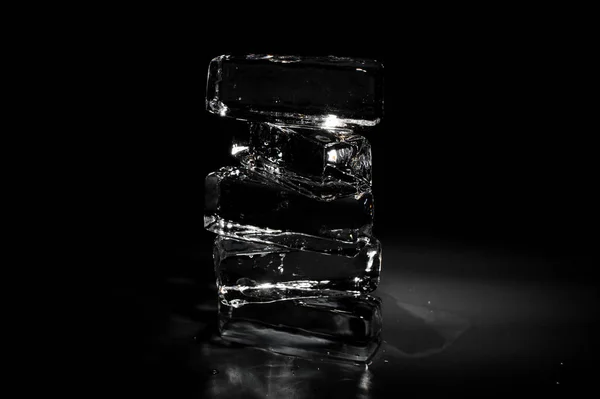 Four Clear Transparent Ice Blocks Isolated Black Background Shining Light — Stock Photo, Image