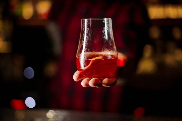 Bartender Serving Glass Sazerac Cocktail Decorated Orange Zest Bar Counter — Stock Photo, Image