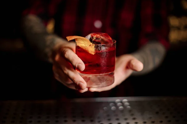 Mixologist Holding Glass Strong Fresh Whiskey Cocktail Decorated Orange Peel — Stock Photo, Image