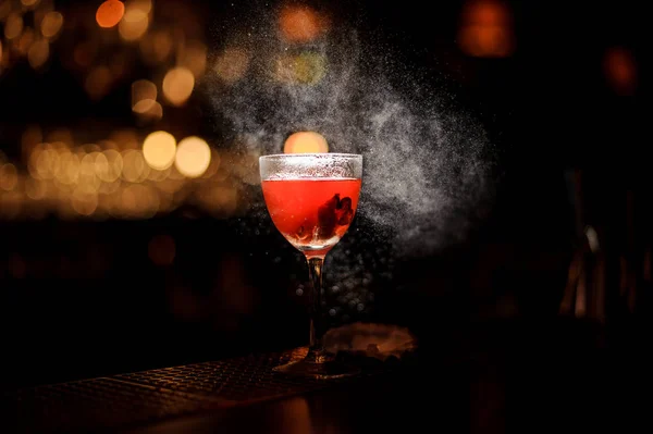 Close-up of an alcohol cocktail with sprayed cloud around it — Stock Photo, Image