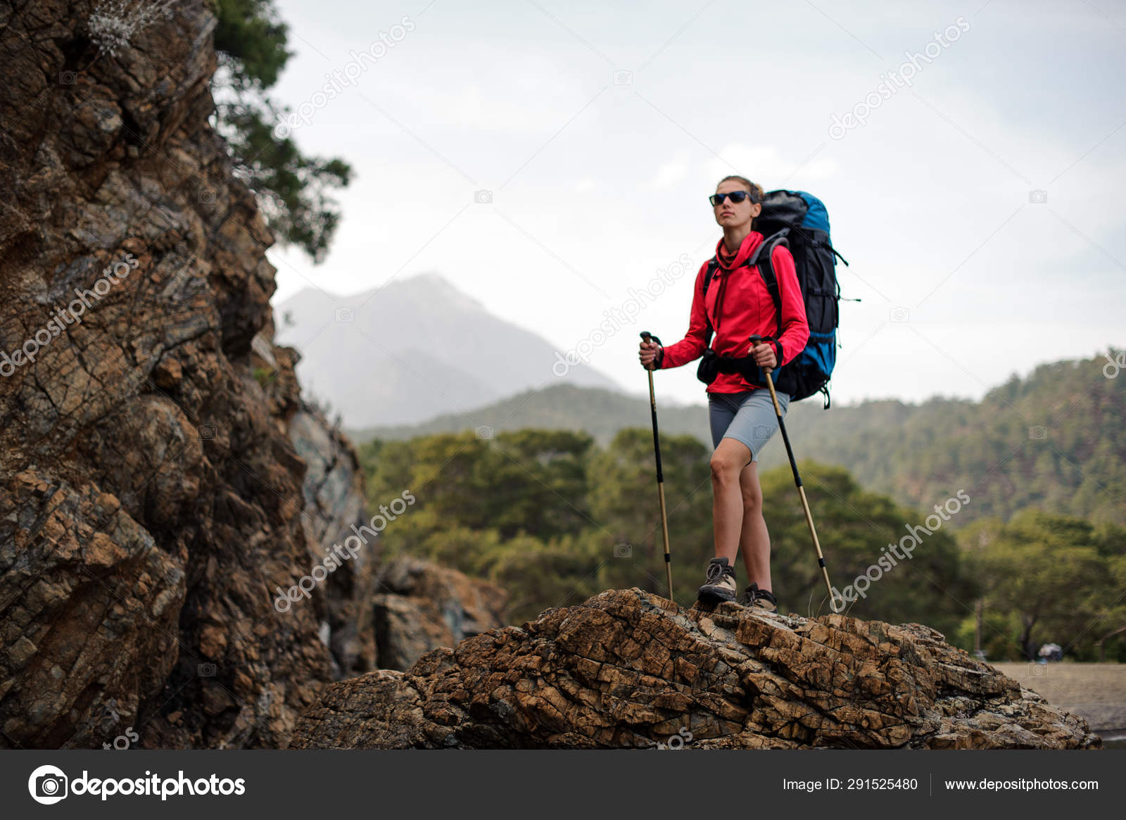 Hiker poses in front of mountain peaks range hiking backpacker old older  aarp strong strength vital energetic landscape photography portrait  background colorful adventure retired retirement outdoor 16780635 Stock  Photo at Vecteezy