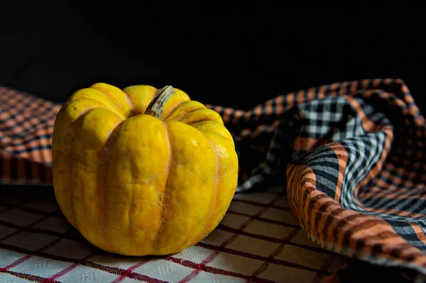 Small Yellow Pumpkin Next Cloth Kitchen Dark Background Copy Space — Stock Photo, Image