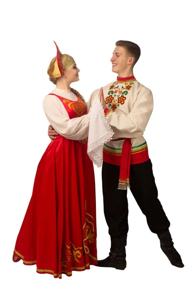 穿着俄罗斯民族服装的美丽的高加索小可爱在白色背景下跳舞 — 图库照片