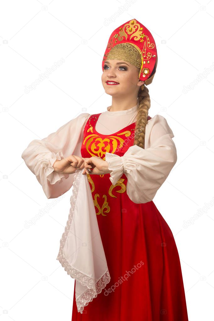 Beautiful smiling caucasian girl in russian folk costume isolated on white background
