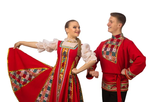 白い背景に分離されたロシアの民族衣装で踊る美しい白人カップル — ストック写真