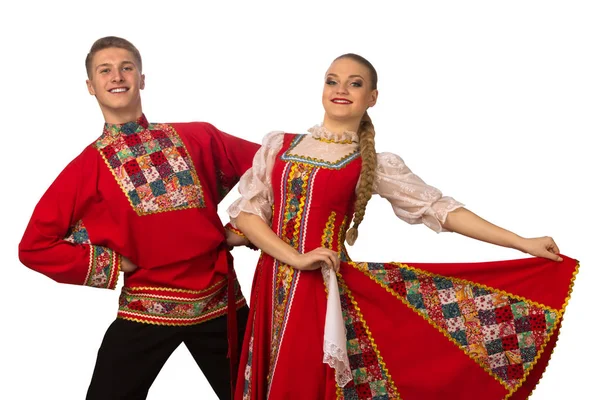 白い背景に分離されたロシアの民族衣装で踊る美しい白人カップル — ストック写真