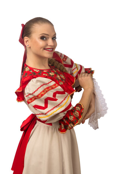 Beautiful smiling caucasian girl in russian folk costume isolated on white background.