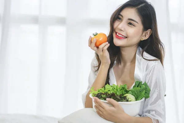 Beautiful Asian woman with healthy food. Heathy life style and Beautiful skin care food concept.