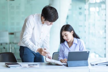 Business team discussing together in conference room during meeting at office. Teamwork, brainstorm and ideas concept.