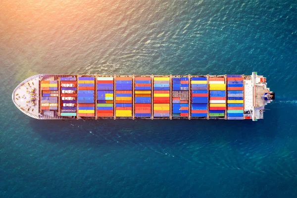 Aerial view of container cargo ship in sea.