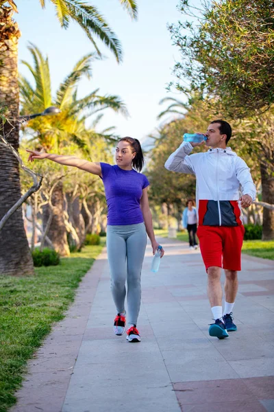 Young Smiling Sporty Man Woman Sportswear Jogging Palm Trees Man — Stock Photo, Image