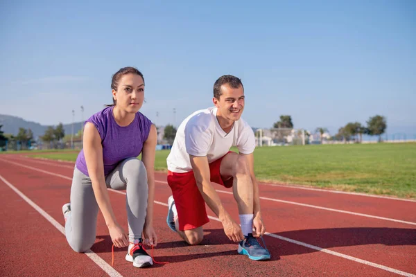 Man Woman Tying Laces Sneakers Jogging — Stock Photo, Image