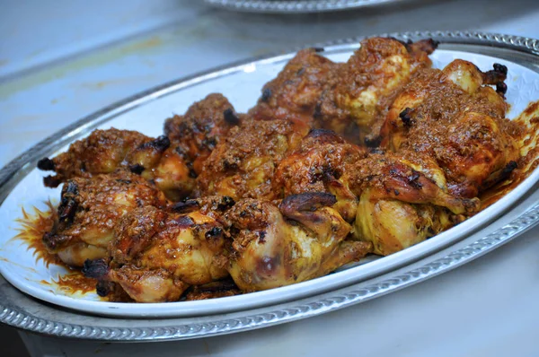 Moroccan reddish chicken is one of the most famous foods in Morocco. Presented at weddings. dajaj mohamar