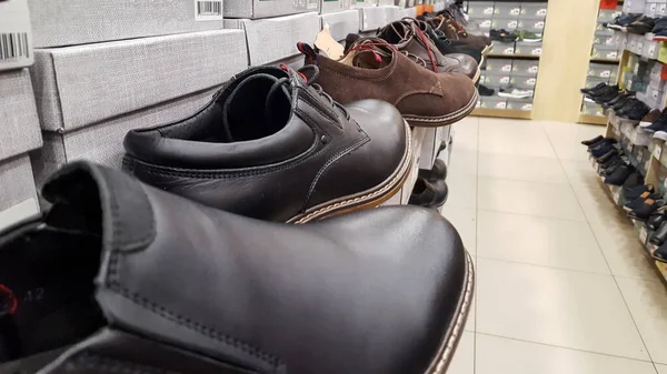 men\'s shoes for sale in a shoe shop