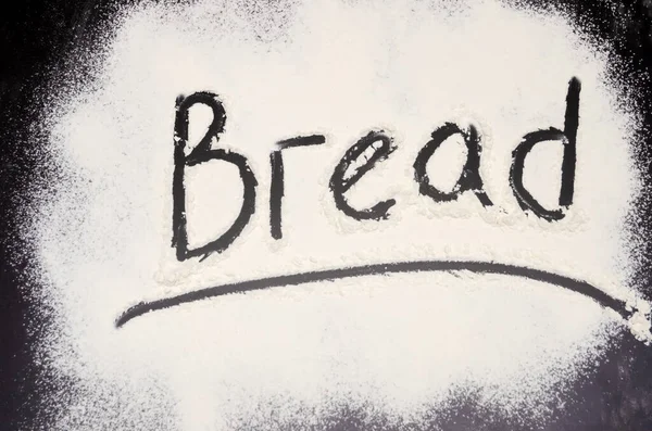 Slova Chléb Napsaný Černém Pozadí Moukou Inscription — Stock fotografie