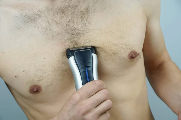Close Naked Man Using Electric Razor Remove Hair His Chest — Stock Photo, Image