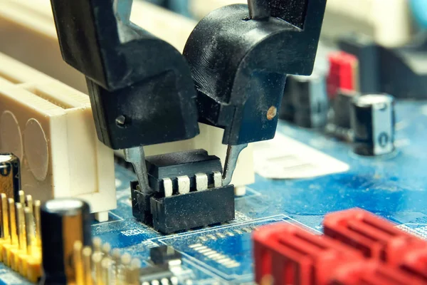 Engineer Removes Programmable Bios Chip Tongs — Stock Photo, Image