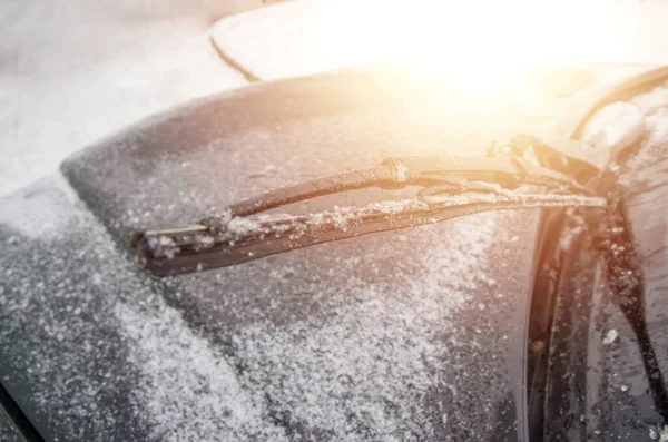 Car wipers covered with ice. Close-up