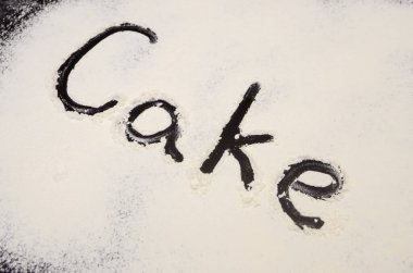 Kelime Keki un ile birlikte siyah bir arkaplanda yazılır. Yazı.