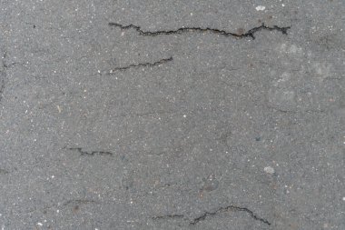 Çizgili asfaltlı gri yolun dokusu, arkaplanı