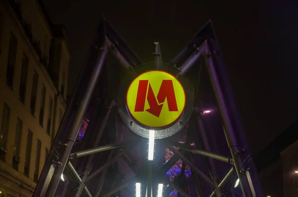 The Metro sign is a rapid transit system serving the city.