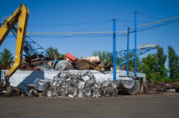 crane grab loading scrap metal. industry concept. Delivery of scrap metal