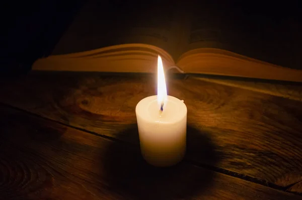 Burning Candle Book Table Dark Wooden Table Concept Knowledge Religion — Stock Photo, Image