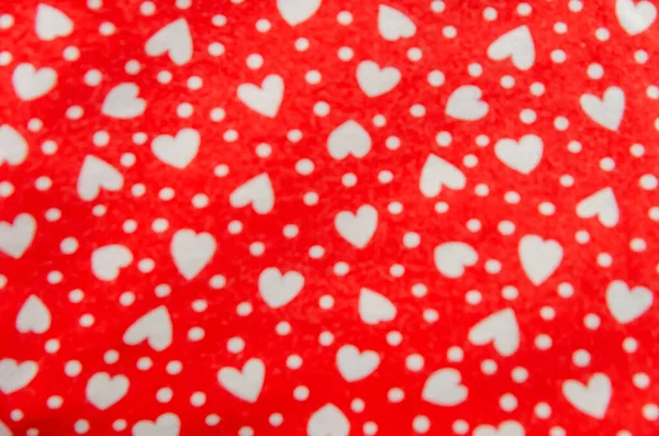 Tissu Rouge Avec Des Cœurs Blancs Défocalisés Fond — Photo