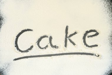 Kelime Keki un ile birlikte siyah bir arkaplanda yazılır. Yazı.