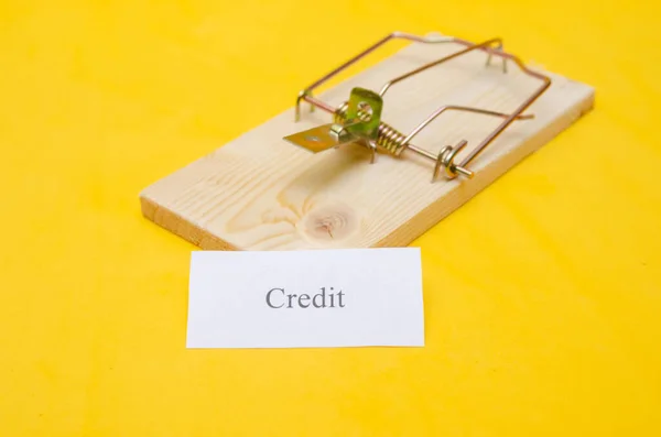 Mousetrap Piece Paper Inscription Credit Yellow Background Copy Space Concept — Stock Photo, Image