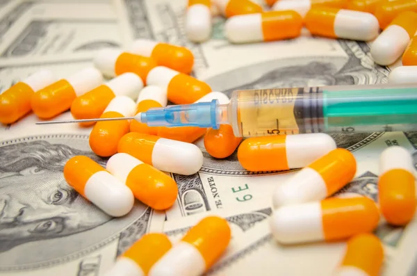 Orange White Pills Syringe Background Dollars Macro — Stock Photo, Image